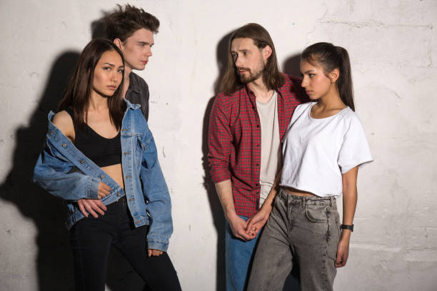 istock Concentrated young hipsters loving couples 1367346158