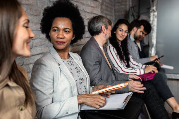 istock Business people waiting for job interview. 1367346409