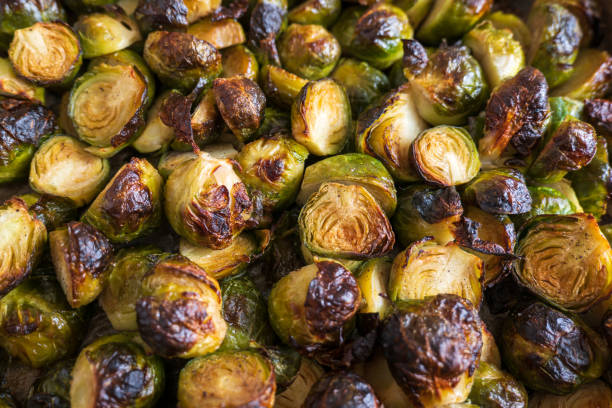 istock oven baked sliced brussels sprouts on baking tray closeup 1367346515