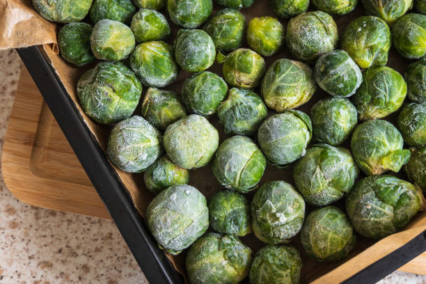 istock frozen frosty look brussels sprouts on baking tray closeup 1367346525