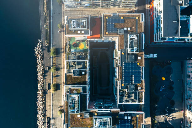 istock Smart city with solar panels on rooftop 1367347980