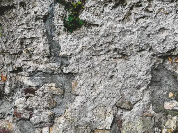 Photo of Stone wall as a texture or background.