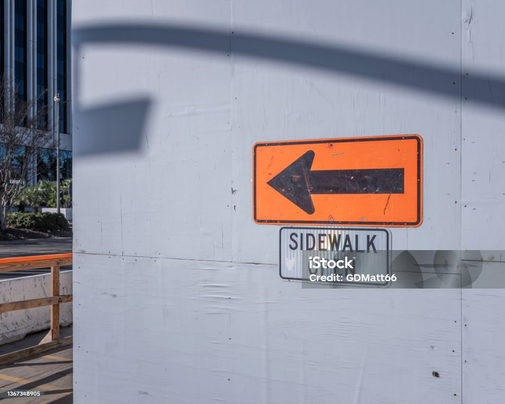 Construction Site Sign Sidewalk open sign with arrow. Arrow Symbol Stock Photo