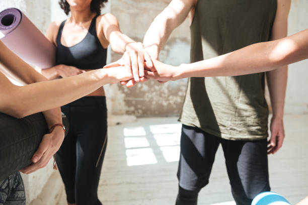 istock Group of healthy people making team gesture 1367349654