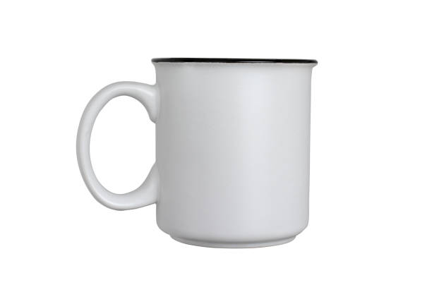istock Ceramic mug of light gray color. Isolated on a white background, close-up 1367349941