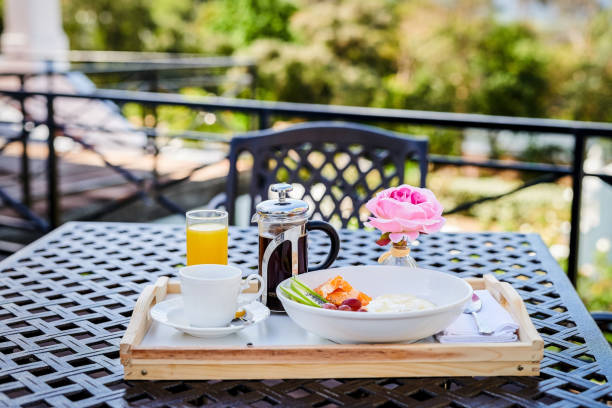 istock High angle shot of a healthy breakfast on a table outside 1367351444