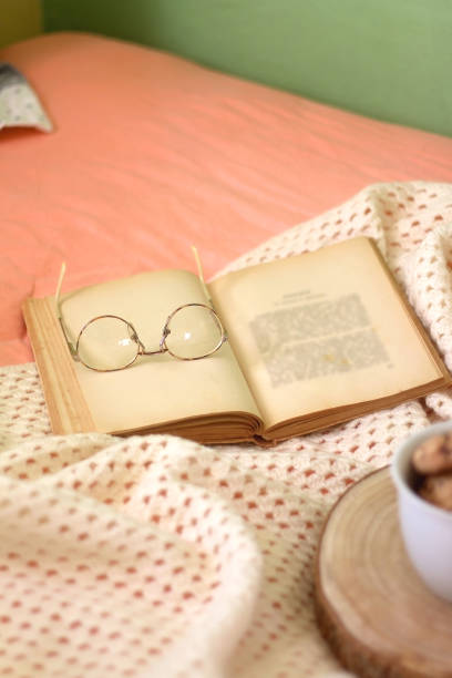 istock Mug with Cookies, Book and Glasses 1367351699