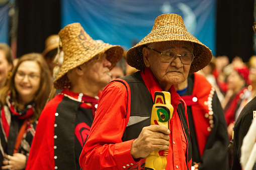 The Nisga'a Nation Hobiyee festival celebrated in Vancouver, Canada on 3 February 2018. The celebration commemorates the Nisga'a Nation's lunar new year. The Nisga'a gathering is powerful with the beating of drums, dance and beautifully intricate regalia. A participating elder.