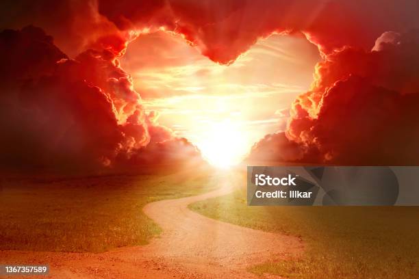 Red Heart Shaped Sky At Sunset Beautiful Landscape With Flowerslove Background With Copy Space Road To Love Stock Photo - Download Image Now