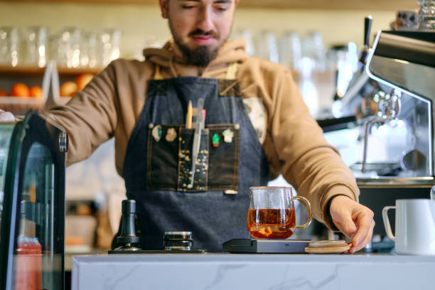Barista making hot tea
