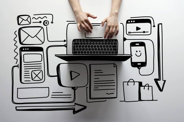 istock A woman is traying to create digital content on her laptop with line icons 1367368043