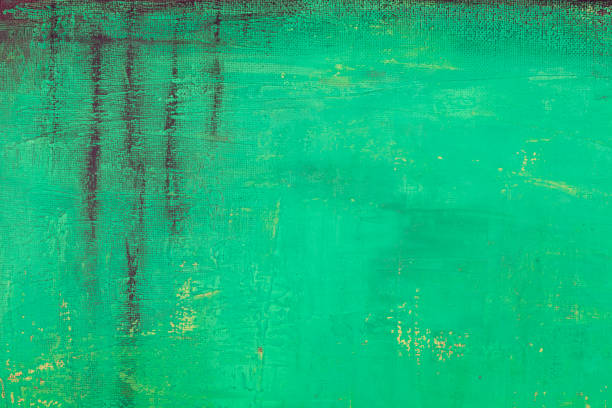 istock Green and black grunge colored texture background. 1367368310