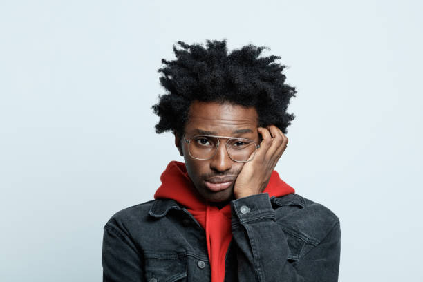 istock Worried man in red hoodie 1367369357