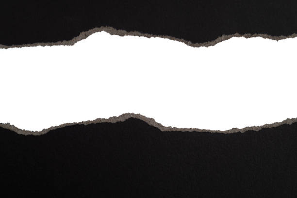 istock Background of torn black paper 1367371002