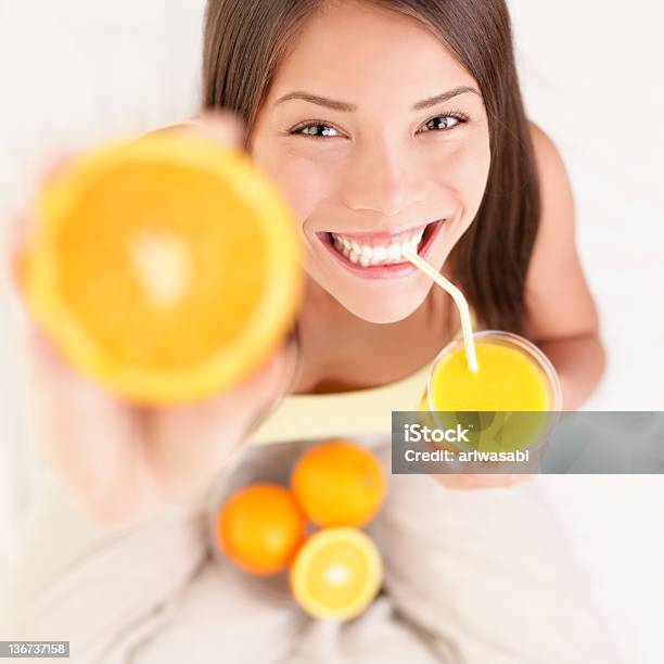 Orange Juice Drinking Woman Stock Photo - Download Image Now - Orange Juice, Orange - Fruit, Drinking