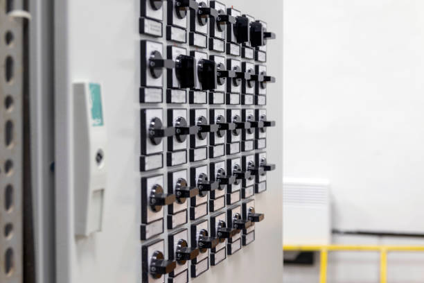 istock Selective focus. Relay hall with panels, control cabinets of a high voltage electrical substation. electrical equipment and system with fuse, circuit breaker, control panel in power plant and substation 1367373452