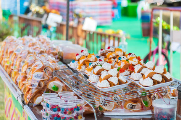 istock Handmade Thai snack crispy pancakes (khanom buang). The traditional Thai dessert generally has 2 types of topping - salty and sweet ,very popular among tourists in street food of Bangkok,Thailand. 1367375567