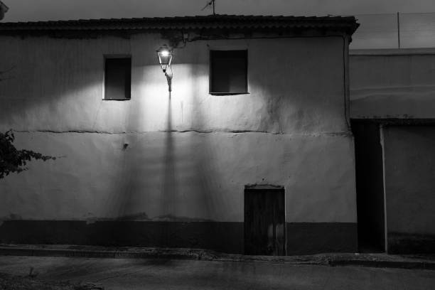 Street light on a facade of a house in La Horra, Burgos, Spain