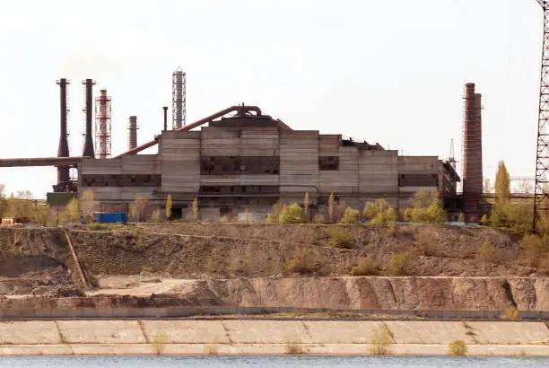 Photo of Ironworks on river coastline