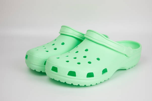 istock Green rubber sandals on a white background 1367377822