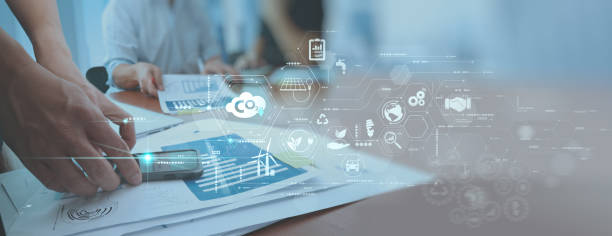 istock Businessman wit team working virtual modern smart phone to reduce CO2 emissions carbon footprint climate change to limit global warming.Sustainable development and green business concept. 1367379397