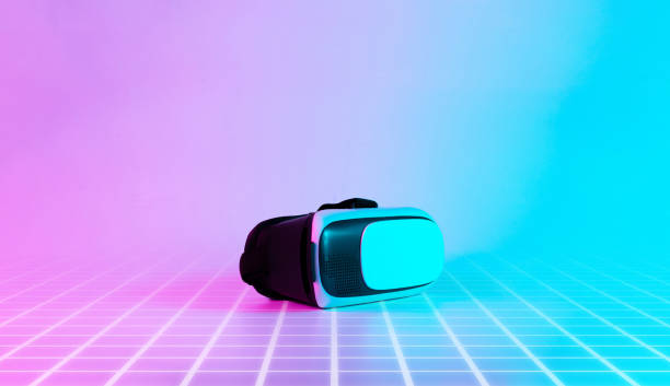 istock VR helmet virtual reality. 3d digital glasses on futuristic neon tech background. Future digital technology metaverse game concept. 1367382990