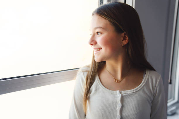 istock Teen spending time on bedroom at home 1367383378