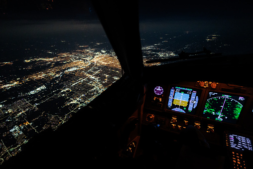 Nighttime view of Kansas City from the flightdeck of a Boeing 737