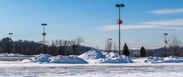 The Monroeville Mall parking lot with piles of snow in Monroeville, Pennsylvania, USA stock photo