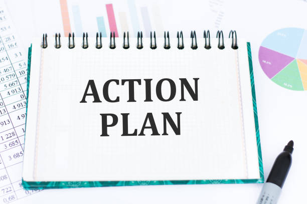 istock action plan text on notebook on the table on the background of reports and charts 1367387453