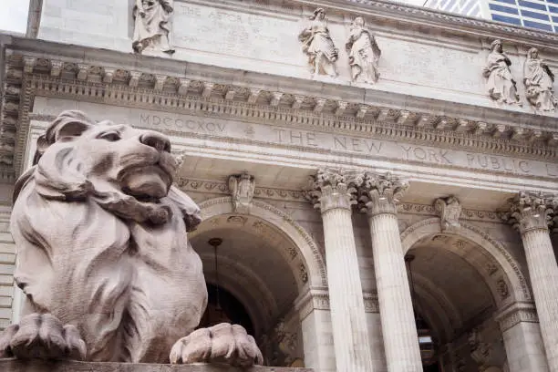 Lion statue at the entrance to the New York Public Library in Manhattan, NYC