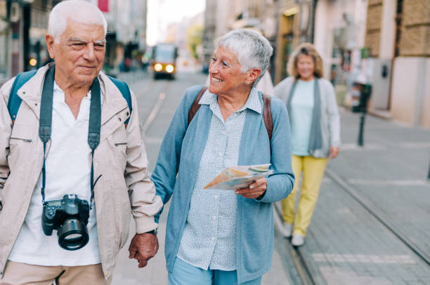 istock Active seniors walking in the city 1367390522