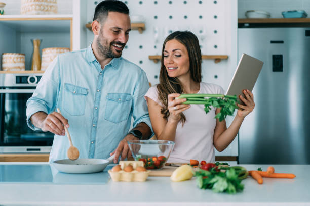 istock Young couple in the kitchen. 1367391500