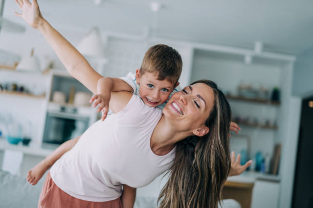 istock Mother and son at home. 1367391507