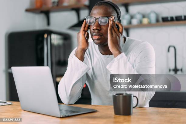 Stressed Businessman Using Laptop At Home Stock Photo - Download Image Now - Struggle, Men, Small Business