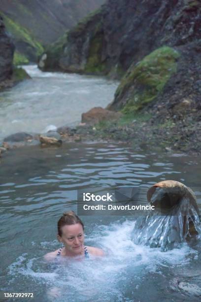 Senior Woman Enjoying Night Bath In Hot Springs Near Camping Kerlingarfjoll On Iceland Stock Photo - Download Image Now