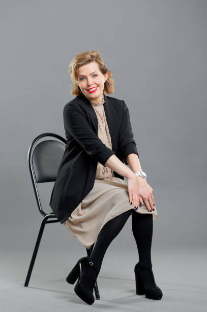 istock girl on a chair 1367392973