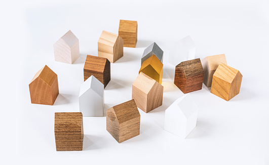 Wooden toy houses on display in a studio