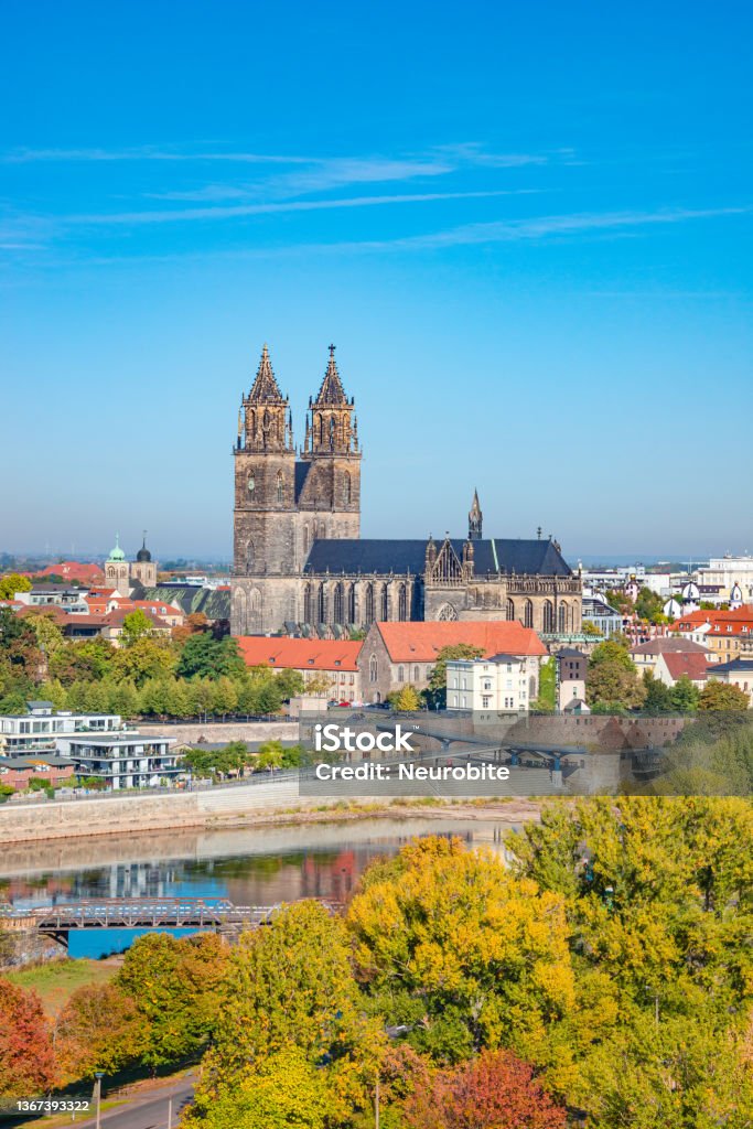 Bird view at Cathedral of Magdeburg during golden Autumn at blue sky and sunny day, Magdeburg, Germany. Concept of historical architecture heritage Magdeburg Stock Photo