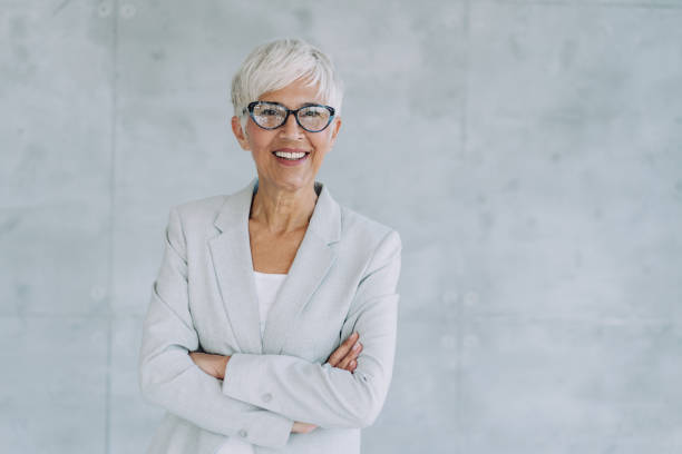 istock Confident businesswoman in modern office. 1367394222