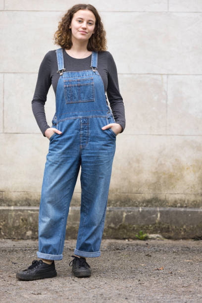 Young lady wearing bib overalls