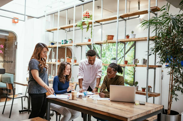 istock Multi-ethnic business team having meeting in the office 1367394639