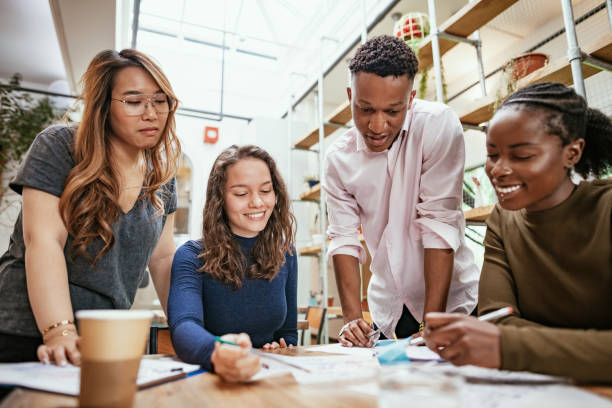 istock Multi-ethnic business team having meeting in the office 1367394650