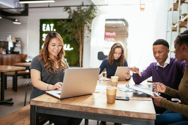 istock Multi-ethnic business team having meeting in the office 1367394668