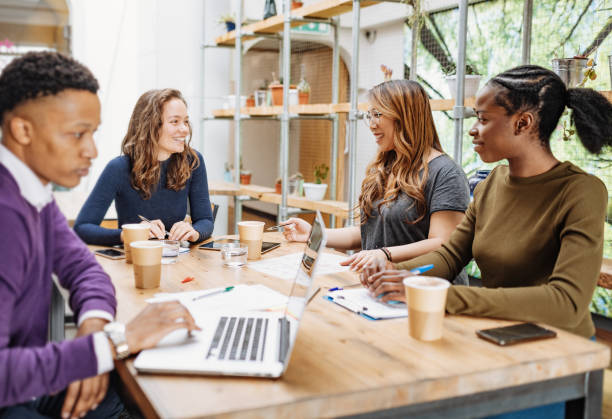 istock Multi-ethnic business team having meeting in the office 1367395358