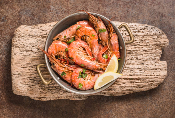 istock Red shrimps copy space tasty plate. 1367395697