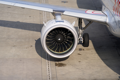 Close-up of flight engine of Swiss Airbus airplane at Zürich Airport on a sunny winter day. Photo taken January 19th, 2022, Zurich, Switzerland.