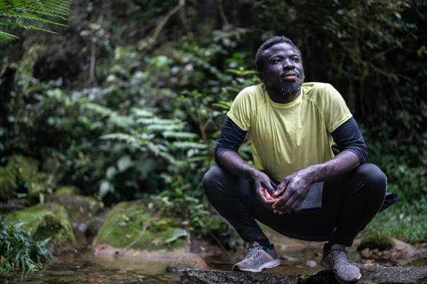 istock Young man contemplating nature 1367397295
