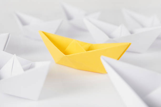 istock Yellow Paper Boat 1367399933