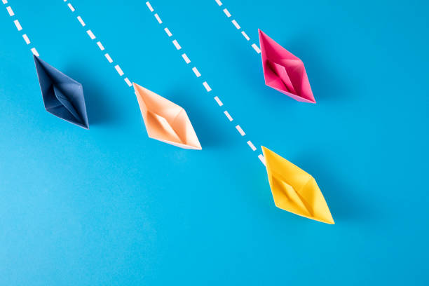 istock Leadership Concept with Paper Boats 1367400326